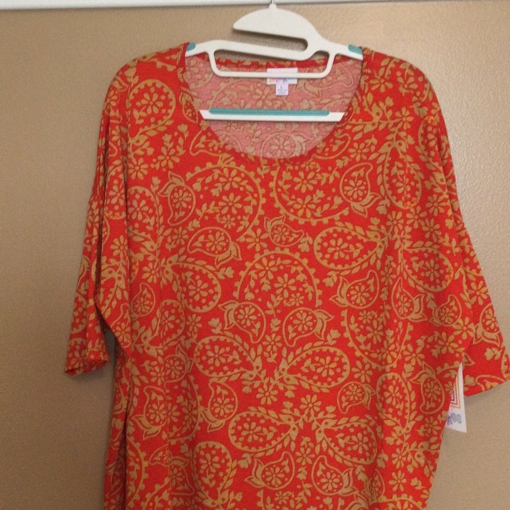 NWT Lularoe Irma shirt size Large. Burnt orange with gold paisley pattern